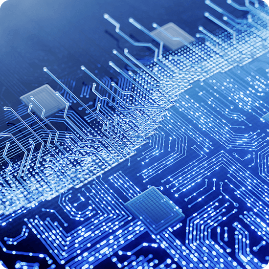 A close-up of a circuit board illuminated by blue lights, showcasing intricate pathways and electronic components.