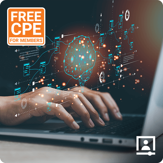 Hand typing on a laptop