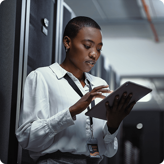 A woman looking at a tablet