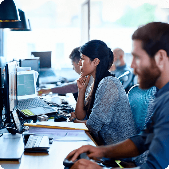 Group of people working in front of computers