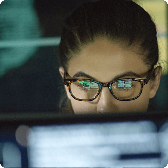 Woman looking at a computer screen