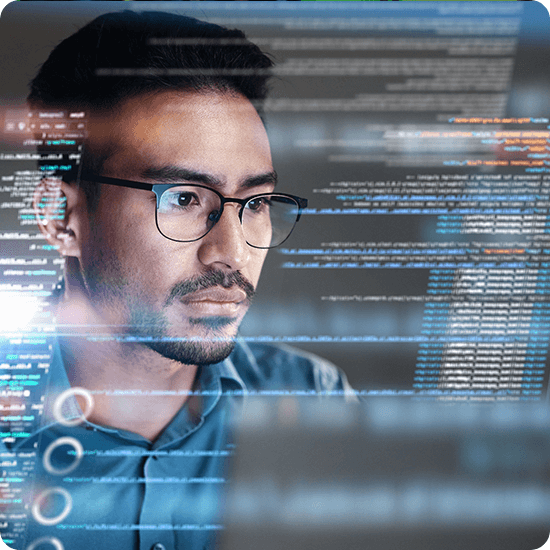 Man looking at a computer screen, with digital overlay