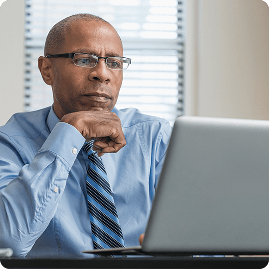 Man looking at a laptop screen